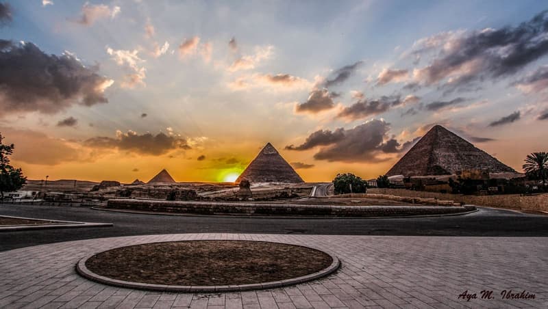 Pyramids silhouetted at sunset