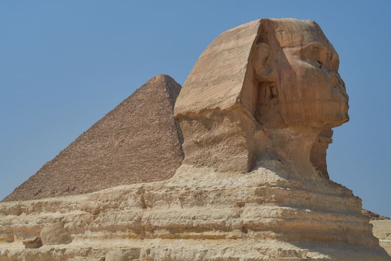 The Great Sphinx and a Giza pyramid
